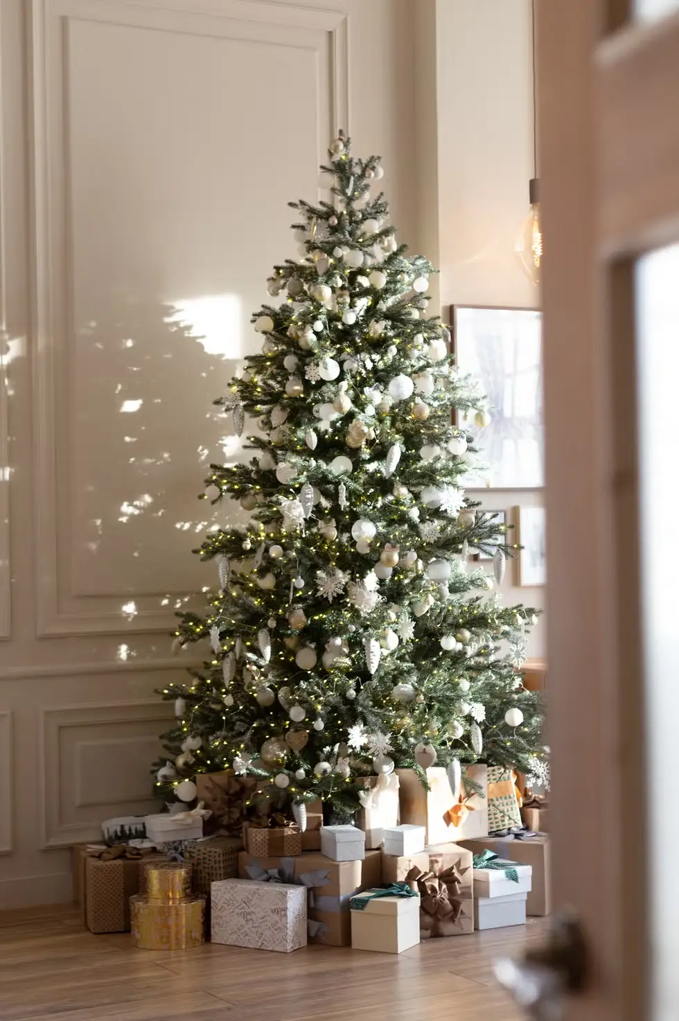 Celebrate This Christmas With Thoughtful Corporate Gifts! A beautifully decorated Christmas tree stands radiant in a cozy living room, surrounded by gifts